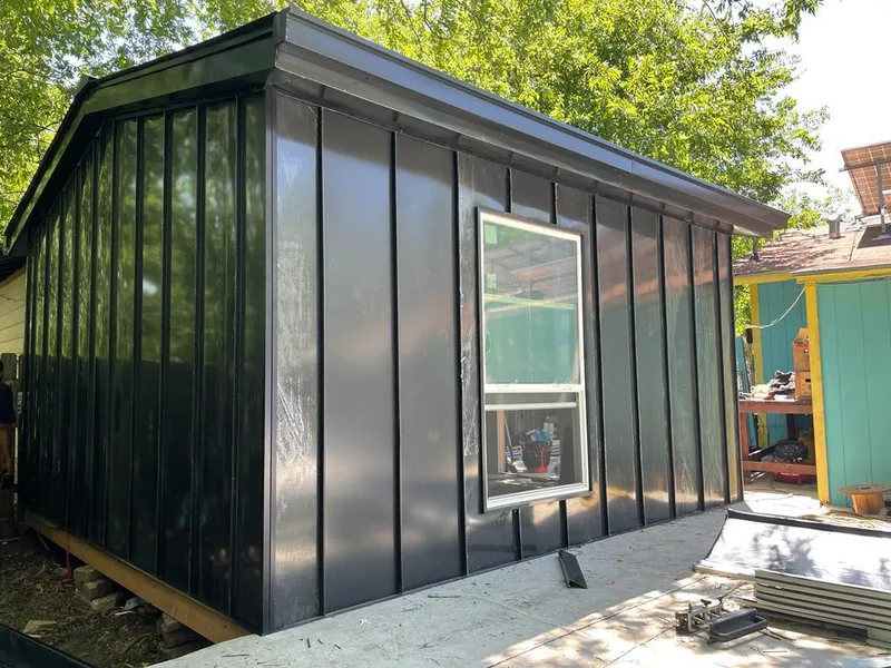 Black standing seam metal wall panels for Roof Inspection in Atmore